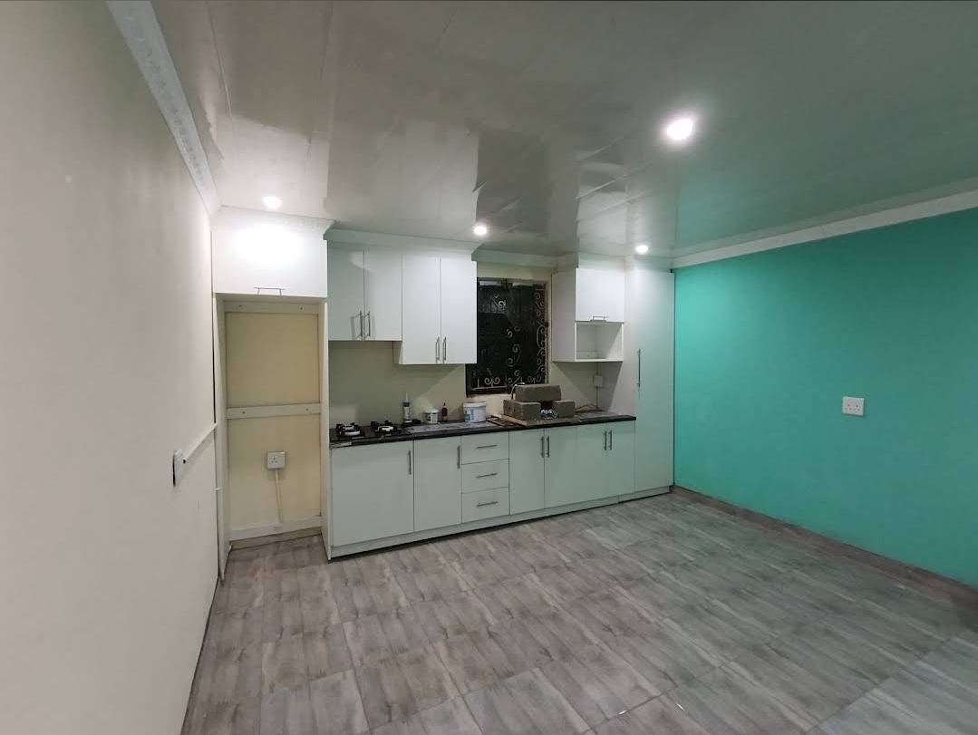 Contemporary kitchen with wood flooring